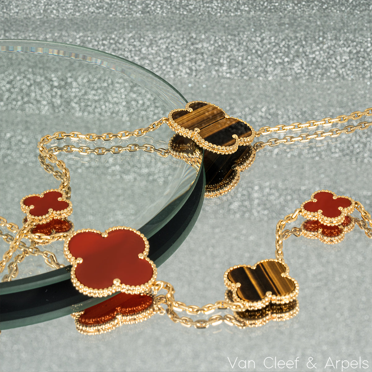 Van Cleef & Arpels Yellow Gold Carnelian & Tiger Eye Magic Alhambra 16 Motif Necklace VCARN5JO00